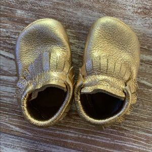 Gold baby leather moccs